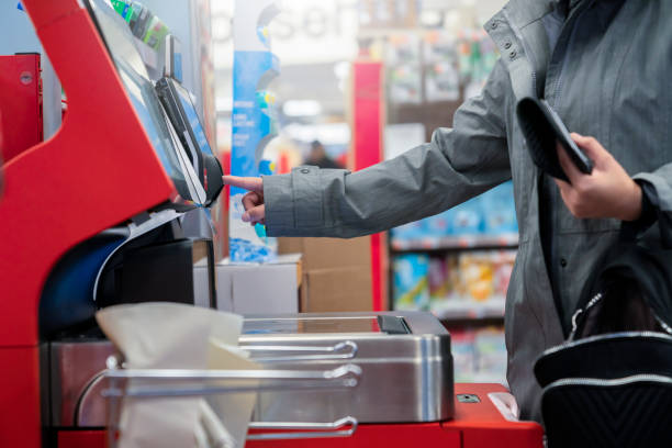 closeup female hand sign and pay money by credit card cashier counter cashless business payment process business ideas concept with abstract blur image background copyspace - cash register coin cash box checkout counter imagens e fotografias de stock