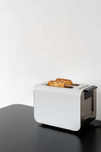 istock Toaster with two slices of bread for sandwiches 1325708030