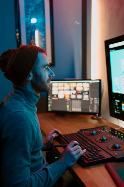 istock Male Video Editor Working on His Personal Computer with Big Display 1325708997