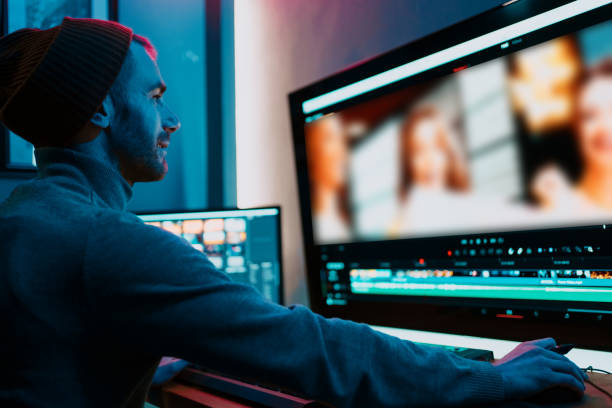 istock Male Video Editor Working on His Personal Computer with Big Display 1325709014