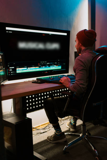 istock Male Video Editor Working on His Personal Computer with Big Display 1325709024