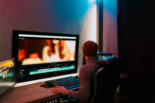 istock Male Video Editor Working on His Personal Computer with Big Display 1325709032