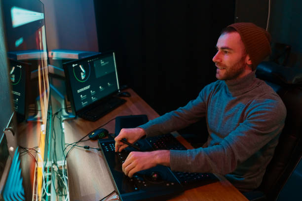 istock Male Video Editor Working on His Personal Computer with Big Display 1325709080