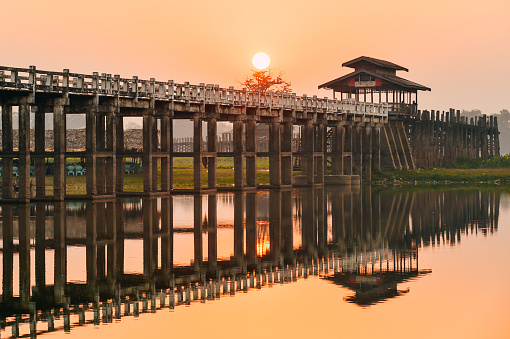 Remaining structure of old bridge and two parallel railway bridges over Krishna river in Vijayawada, India.