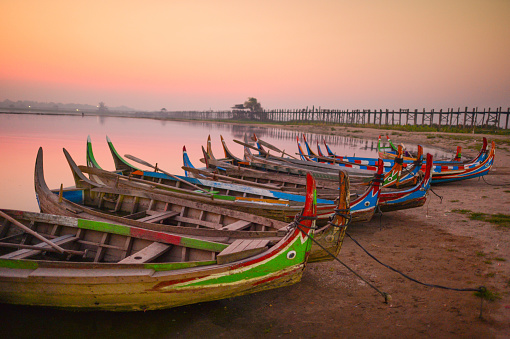 Sunset in Laguna Lake with row of boats