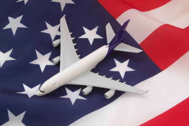 istock Airplane on USA flag. 1325713205