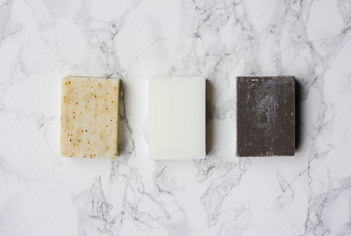 A set of 3 handmade soaps made from different ingredients.