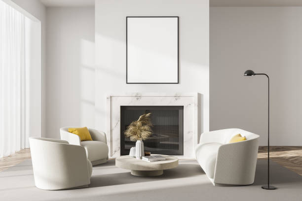 istock White room interior with fireplace, armchairs and lamp, mockup poster 1325714449