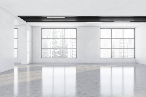 istock White and wooden large empty office room with windows 1325715872