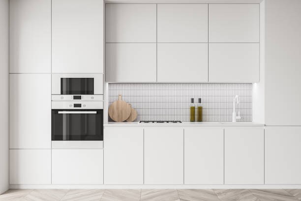 istock White kitchen set with shelves and appliances, parquet floor 1325716705