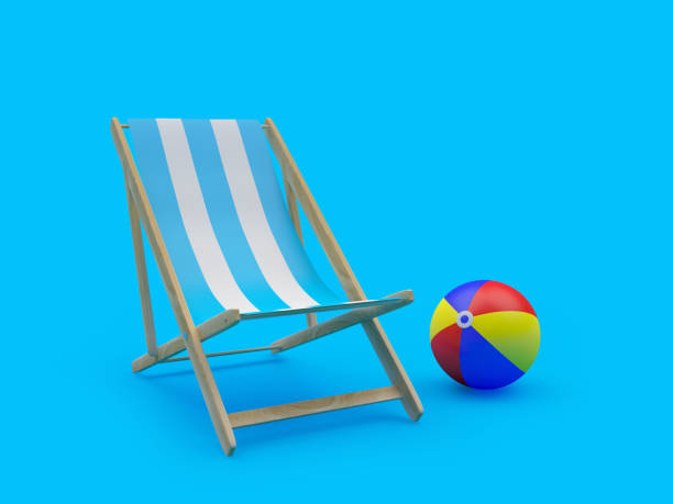 istock Empty striped deck chair with colorful beach ball 1325716990