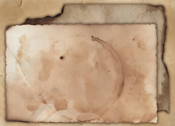 istock Old vintage texture retro paper with burned edges, stains and scratches background 1325717419