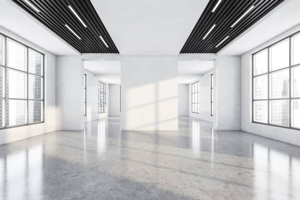 istock White and wooden large empty office room with windows 1325718186