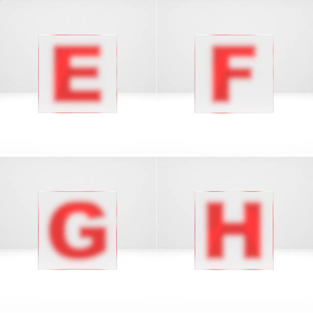 istock E, F, G, H letters through matte glass. 1325719704
