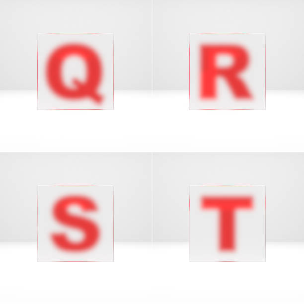 Q, R, S, T letters through matte glass.