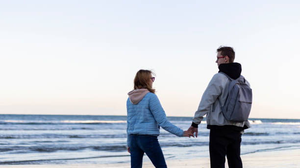 istock Couple in love by the sea. 1325722155