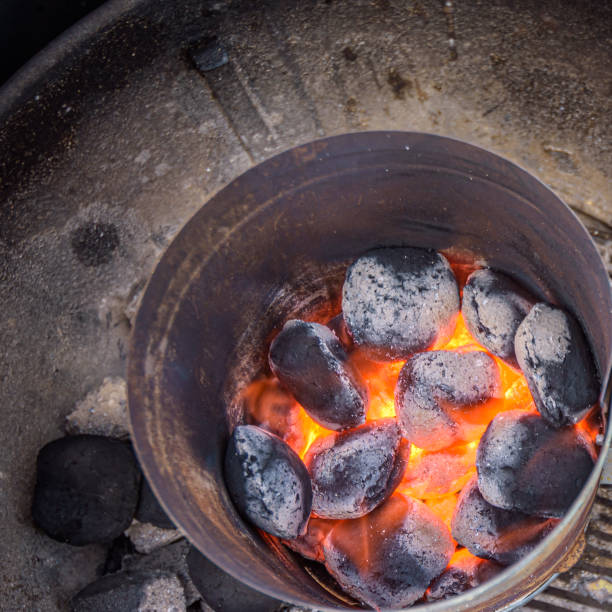 istock Barbecue with hot red charcoal 1325729937