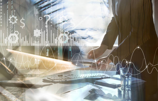 istock Business woman works with financial graphs on the virtual screen. Modern technology and digital layer effect shows business strategy.  Trade, success, control concept. 1325730140