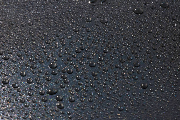 istock drops of water on a black background 1325730973