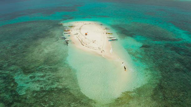 istock Tropical island with sandy beach. Camiguin, Philippines 1325733227