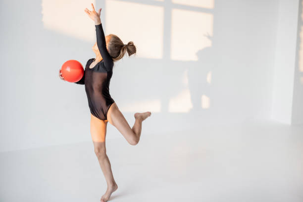 istock Girl practising rhythmic gymnastic with a ball 1325736182