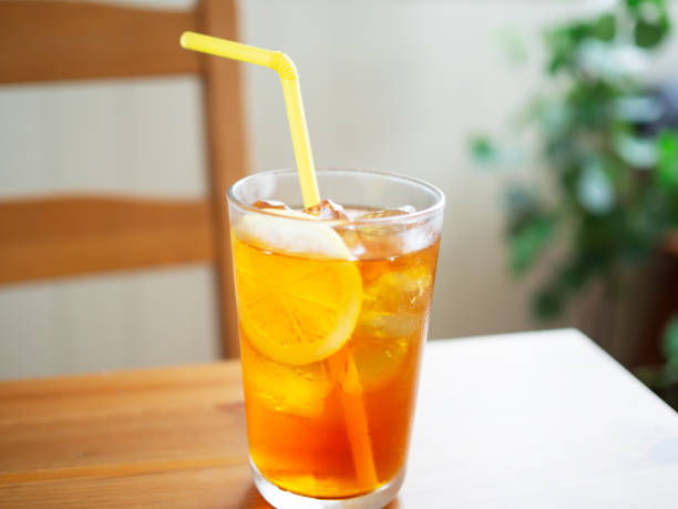 istock Glass of lemon iced tea on table 1325737578
