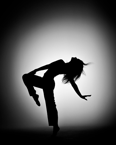 Silhouette portrait of african american girl with curly hair afro hairstyle isolated on white background.