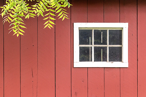 Window on the side of an old barn