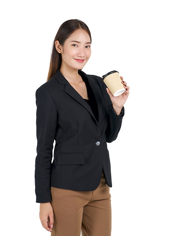 Young asian women in black suit with a smile holding a cup of coffee. Portrait on white background with studio light.