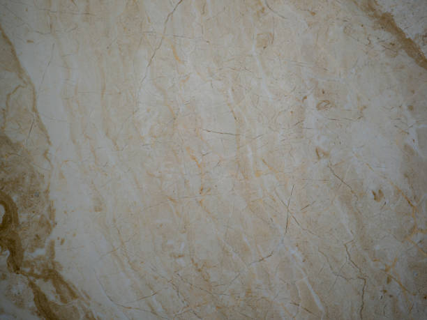 istock Beige marble background with light brown inclusions. 1325747043