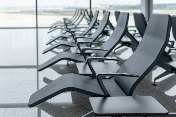 istock Comfortable deck chairs of airport waiting area 1325747173