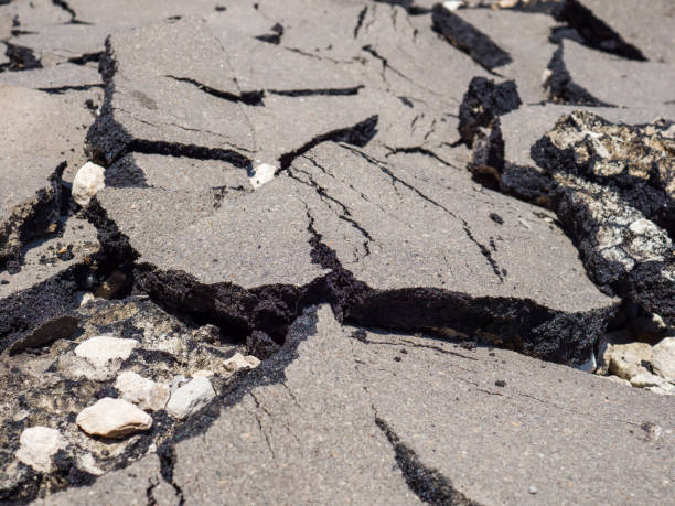 istock The consequences of the earthquake. Swollen broken asphalt. 1325748204