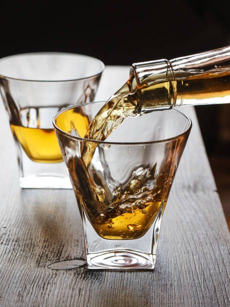 istock Whisky being poured in a glass 1325749844