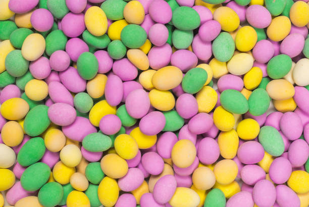 istock Group of colorful peanuts in glaze. 1325750845