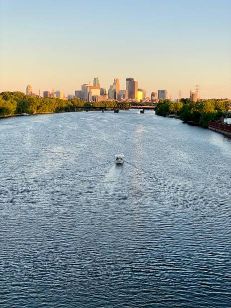 istock Mississippi River and Minneapolis Skyline at Sunset 1325756563