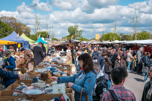 Berlin, Germany - May, 2019: People on flea market at Mauerpark on sunday in Berlin