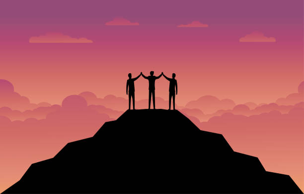 istock Silhouette of the businessman team on the mountain 1325761226