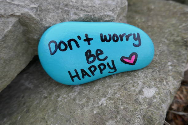 Don't worry be happy and valentine heart painted on kindness rock
