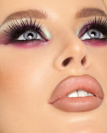 close up beauty portrait with chubby lips and professional make up