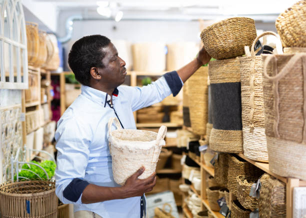 istock African American looking for decorative wicker basket at store 1325767471