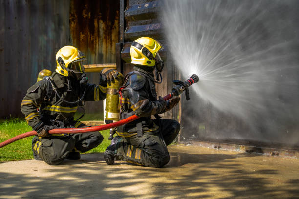 istock Firefighters are conducting fire drills by spraying water to extinguish the raging fire. 1325767736