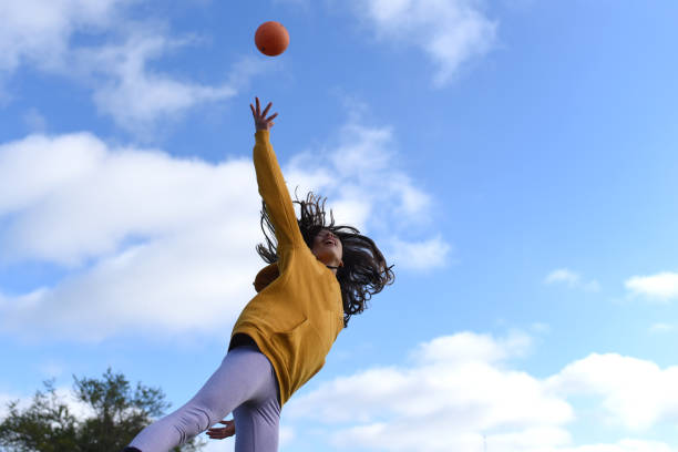 istock children playing outdoors 1325774522