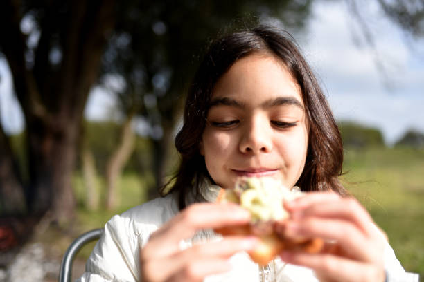 girl eating sandwich