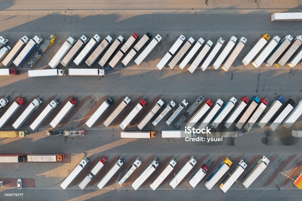 trucks parking lot 1 Trucks parked in the parking lot. Directely above. Fleet of Vehicles Stock Photo
