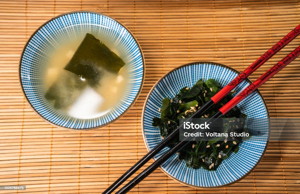 Miso soup and wakame salad Shot from above of miso soup and wakame seaweed salad Wakame Stock Photo