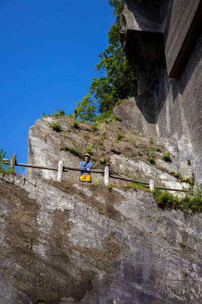Japanese young woman visiting Chiba prefecture to climb Mt. Nokogiri, which is a popular mountain in Chiba prefecture for beginner climbers.