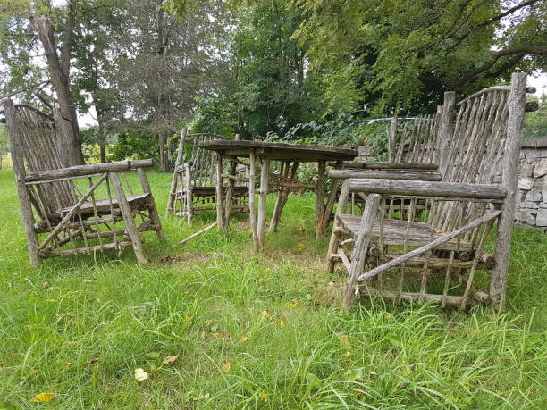 istock Old and wooden table and chairs 1325799910