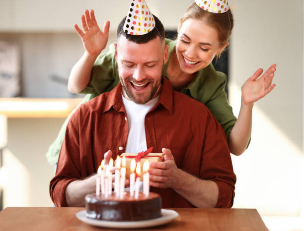 istock Loving wife making surprise for husband on Birthday 1325802485