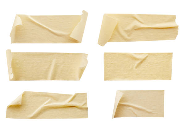 istock Yellow adhesive paper tape isolated on white background 1325814534