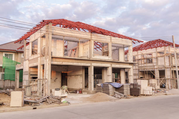 istock construction residential new house in progress at building site 1325814541